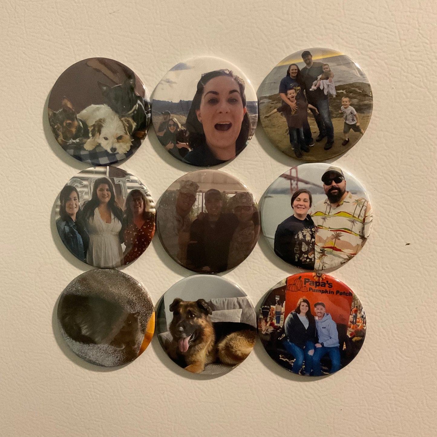 Collection of circular photos on a textured freezer surface